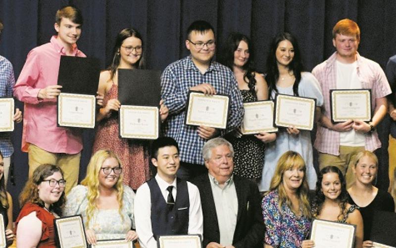 The Cody Family Scholarship was afforded to 19 different Robbinsville students at May 16's Academic and Scholarships program. All names are listed from left. Front row: Delaney Hooper, Lindsay Brittain, Emma Harrison, Erica Daniels, Michael Yan, Dirk Cody, Dana Adams, Destanee Trammell, Kensley Phillips, Montana Adams, William Cable and Caleb Turpin. Back row: Elizabeth Boyle, Alex Knight, Logan Hooper, Mackenzie Brooks, William Carpenter, Abigayle Lancaster, Lorin Hogsed, David Lovingood and Brock Adams.