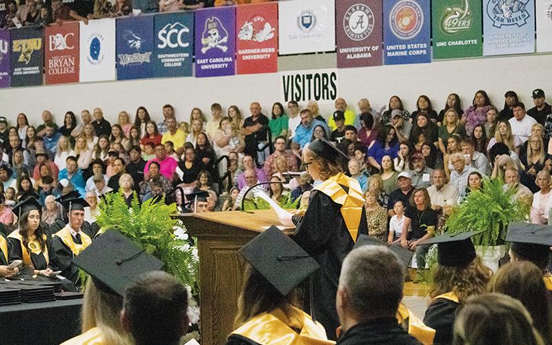 The gymnasium was packed to capacity for graduation Friday, which was the first time the exercise had been held inside the school since 2019. Photo by Anna Riddle/The Graham Star