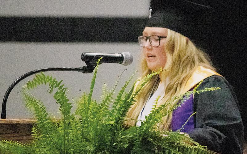 Co-salutatorian Erica Daniels made sure to remind her classmates that their individual stories have just started to be written. Photo by Anna Riddle/The Graham Star