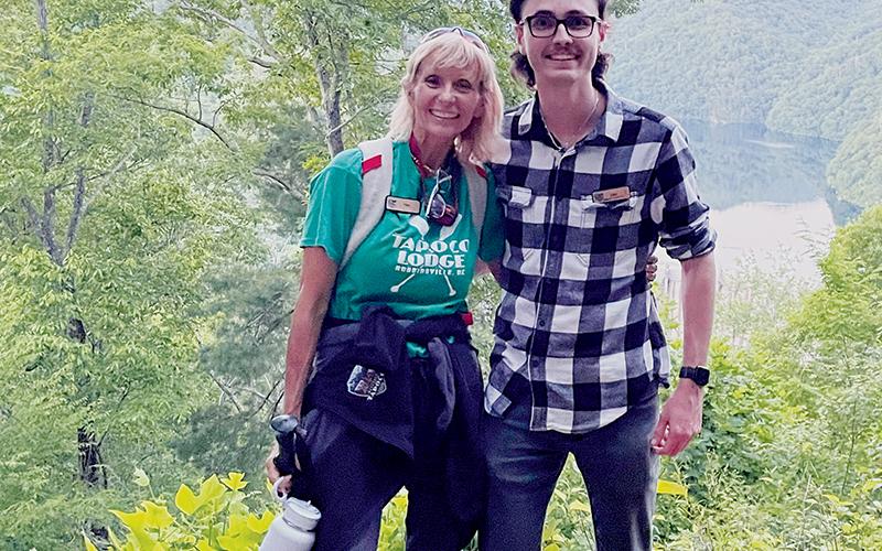 Today, Tina Wesson (left, pictured with marketing director Erik Barnett) is the  activities director at Tapoco Lodge. Over 20 years ago, she proved her outdoor  prowess by winning the long-running competition show, “Survivor.”