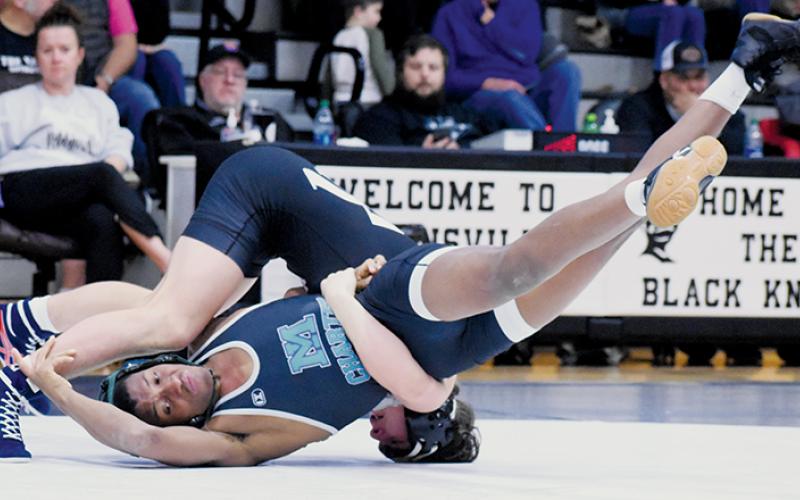 Lleyton Hooper has Mountain Island Charter’s Ethan Hayes searching for answers during the 144-pound bout of Saturday’s first-round playoff dual. Photo by Kevin Hensley/sports@grahamstar.com