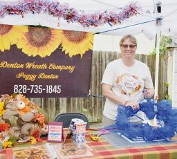 Peggy Denton of Denton Wreath Company was one of many vendors on-hand for the third annual Robbinsville Fall Arts & Crafts Festival on Saturday. Photo by Art Miller/amiller@grahamstar.com