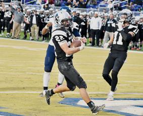 Robbinsville senior Rylee Anderson crosses the threshold for one of his five rushing touchdowns during Saturday’s 1A state championship game against Northampton County. Photo by Kevin Hensley/editor@grahamstar.com