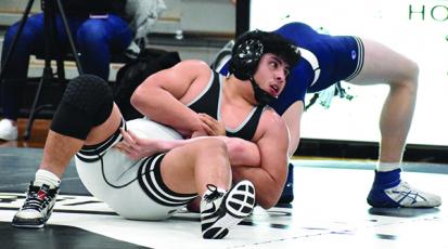 Robbinsville's Jaret Panama has Mount Airy's Luke Leonard down for the count in the 170-pound bout of Tuesday's second-round state dual. Photo by Kevin Hensley/editor@grahamstar.com