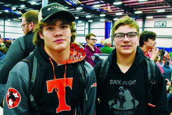 Robbinsville Middle School’s Kage Williams (left) and Koleson Dooley pause between bouts at Saturday’s state championship tournament in Concord. Photo by Kevin Hensley/editor@grahamstar.com