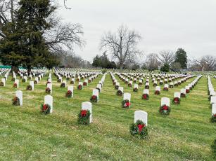 Each December, volunteers visit Arlington National Cemetery near Washington, D.C., to wreaths on gravestones. The annual tradition started in 1992 and one local family started participating in the memorial a few years ago.