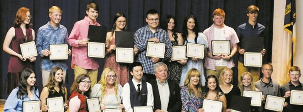The Cody Family Scholarship was afforded to 19 different Robbinsville students at May 16's Academic and Scholarships program. All names are listed from left. Front row: Delaney Hooper, Lindsay Brittain, Emma Harrison, Erica Daniels, Michael Yan, Dirk Cody, Dana Adams, Destanee Trammell, Kensley Phillips, Montana Adams, William Cable and Caleb Turpin. Back row: Elizabeth Boyle, Alex Knight, Logan Hooper, Mackenzie Brooks, William Carpenter, Abigayle Lancaster, Lorin Hogsed, David Lovingood and Brock Adams.