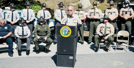 Flanked by officers and representatives from both North Carolina and Tennessee, Swain County Sheriff Curtis Cochran speaks during the “Border to Border” Tail of the Dragon Education Campaign Launch at Deals Gap Motorcycle Resort on June 13. Photos by Kevin Hensley/editor@grahamstar.com