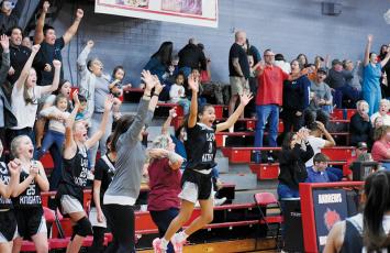 The reaction milliseconds after Daphne Barlow roped a long-range prayer through the net to lift Robbinsville past Andrews on Nov. 16 varied, depending on which side of the scorer’s table fans were seated on. Photo by Kevin Hensley/sports@grahamstar.com