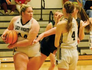 Senior center Aubrie Wachacha rips free from a rebound struggle with Highlands on Jan. 4. Wachacha’s early run in the game set the path for Robbinsville to conquer the Lady Highlanders. Photo by Fala Welch/The Graham Star