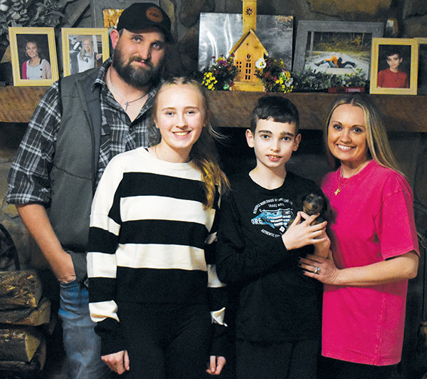 The Buchanan family is tightly knit, fully supportive of Abel and grateful for his rise above adversity. From left are Chevron, Khaygen, Abel and Catrina Buchanan.