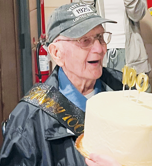 Milltown’s Doyle Brock was thrilled to see his 100th birthday cake while celebrating with family the weekend of Sept. 6.