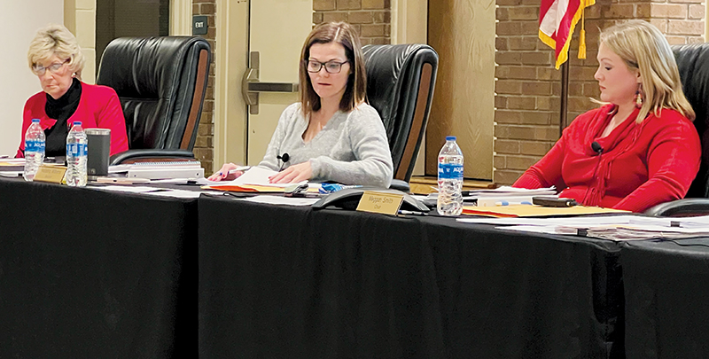 The first known female majority in the history of the Graham County Board of Commissioners process the pitch for a full-time animal control officer and funding to be given to the Valley River Humane Society on Tuesday. From left are Connie Orr, Natasha Williams and Meggan Smith.