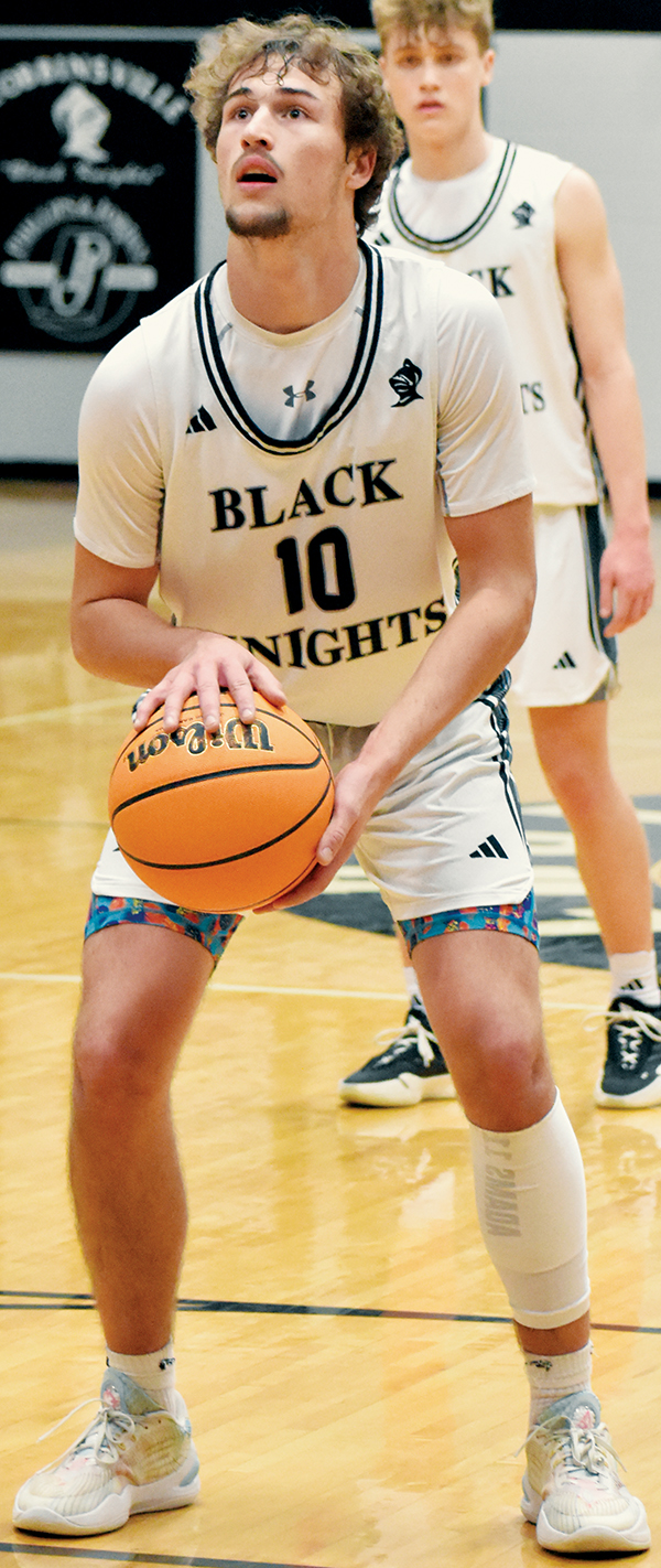 Bryce Adams sizes up a free throw shortly after scoring his 1,000th career point from the charity stripe Jan. 8.