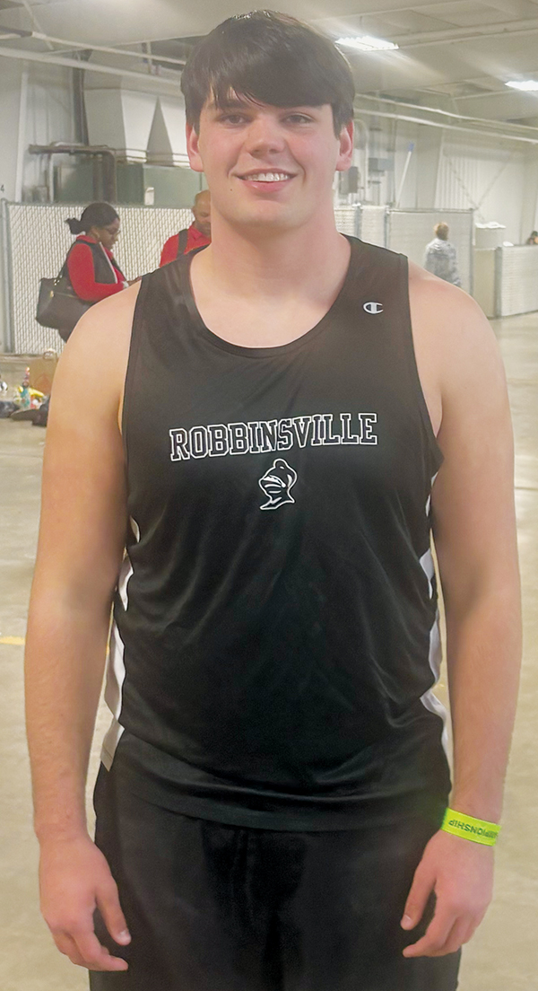 Isiac Collins won the shot-put state title at Feb. 11's meet, recording a distance of 53' 11 ½.”