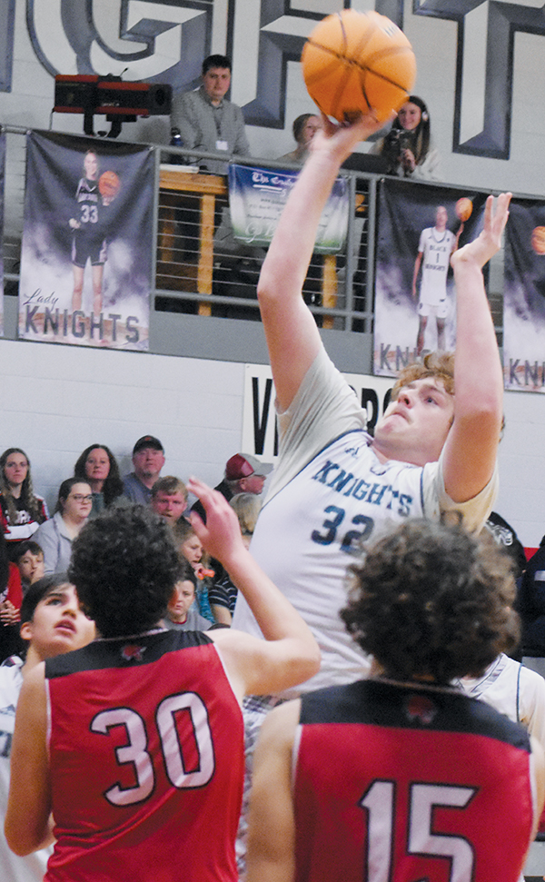 Landon Eddings rises above the Andrews defense for a first-half bucket attempt during JV boys action Friday. Eddings went on to hit the game-clinching basket after blocking a Wildcats shot in the closing seconds of the game. Photo by Kensie Belk/The Graham Star