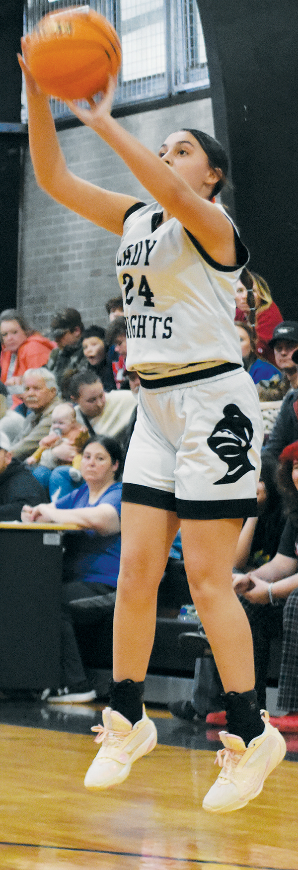 McKynlee Adams unloads a 3-pointer during Dec. 18's home game versus Andrews. Adams tallied 23 in Monday's road win over Rosman. Photo by Kevin Hensley/sports@grahamstar.com