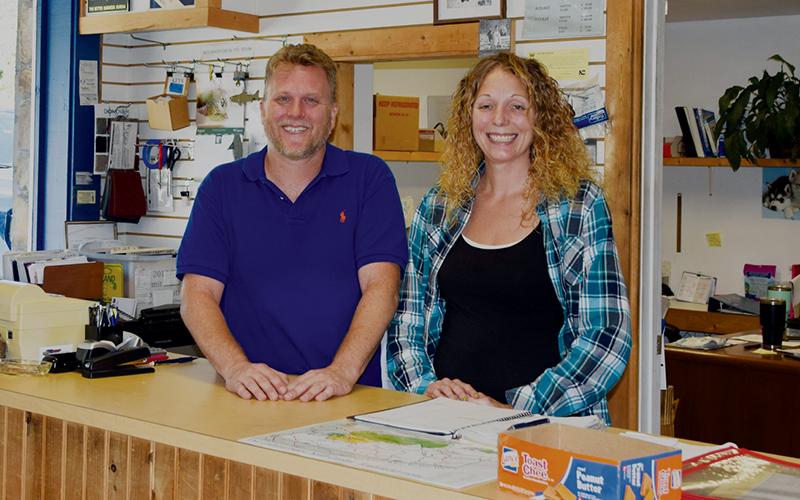 Jim Suprinski (left) and Diana Cole-Joerns moved from Illinois to live their dream of owning their own business. The couple now owns The Boat &amp; Auto Shop on Tallulah Road. Photo by Art Miller/amiller@grahamstar.com