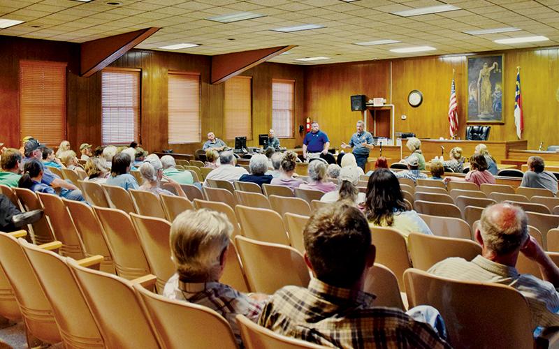 Graham County Sheriff Joseph Jones (left) and Chief Deputy Chuck Stewart address a group of concerned citizens gathered inside the courthouse during a community safety meeting on Sept. 17. Photo by Art Miller/amiller@grahamstar.com