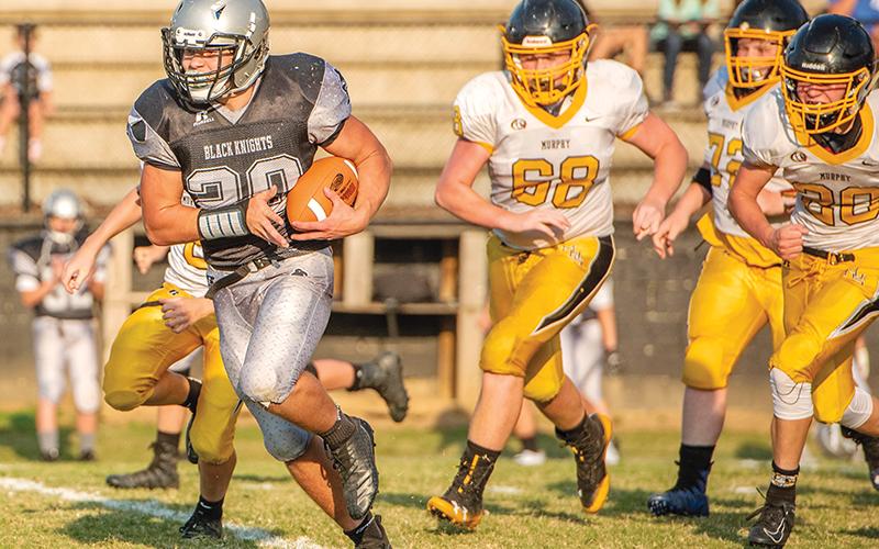 JV Black Knight Kage Williams gave the Murphy defense fits throughout Robbinsville's 48-30 over the Bulldogs on Sept. 12. Photo by Byron Housley/The Graham Star