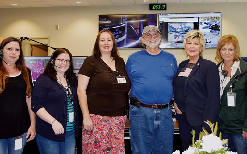 Robbinsville – The Graham County Communications Center came alive Friday when the center threw open its doors to community members.  	The new center’s first open house offered tours of the facility, as well as refreshments and opportunities to meet the folks who make the center work. 	The state-of-the-art, grant-funded facility opened last November and is the most secure building in Graham County. 	 The 4,000 square-foot structure is tornado-proof and designed to keep operations running in any conditions.