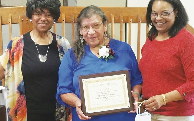 Snowbird resident Onita Bush (center) was presented with the One Dozen Who Care’s Community Treasure Award on Saturday, Nov. 9. With Bush is organization founder Ann Miller Woodford and director Dawn Colbert.