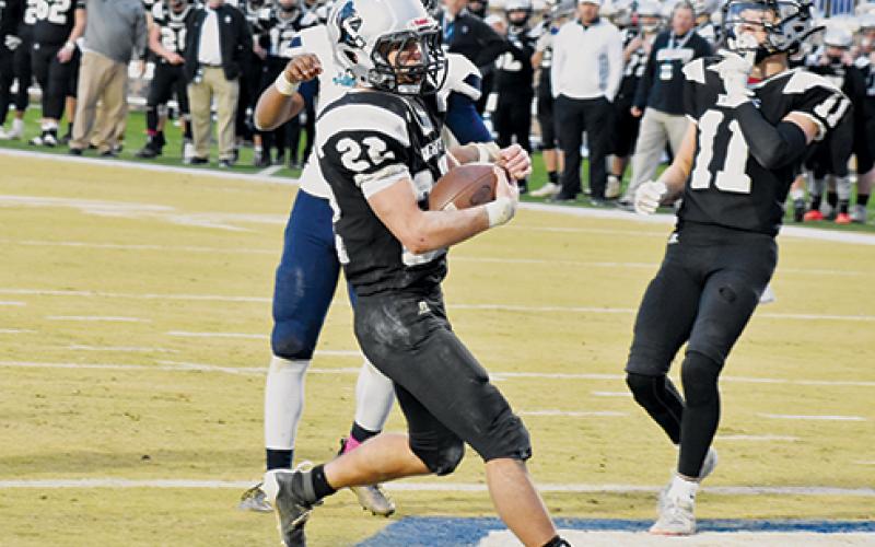 Robbinsville senior Rylee Anderson crosses the threshold for one of his five rushing touchdowns during Saturday’s 1A state championship game against Northampton County. Photo by Kevin Hensley/editor@grahamstar.com