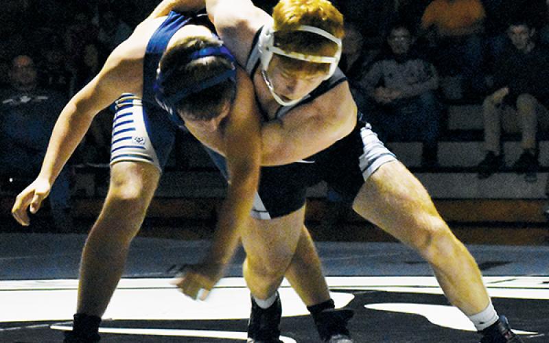 Robbinsville’s Jacob Hall muscles his T.C. Roberson opponent down to the mat during Nov. 26’s 152-pound bout. Photo by Kevin Hensley/editor@grahamstar.com