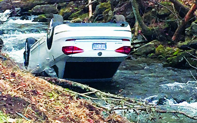 Jason William Burrell’s five-day crime spree ended Wednesday, Jan. 22, when the Volkswagen he had stolen crashed in Bellvie’s Curve on Junaluska Road in Cherokee County. Photo by Robbi Pounds/rpounds@grahamstar.com