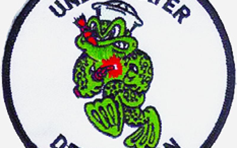 The shoulder/sleeve patch of the Naval Underwater Demolition Team, which served as a precursor to the present-day Navy SEALs.