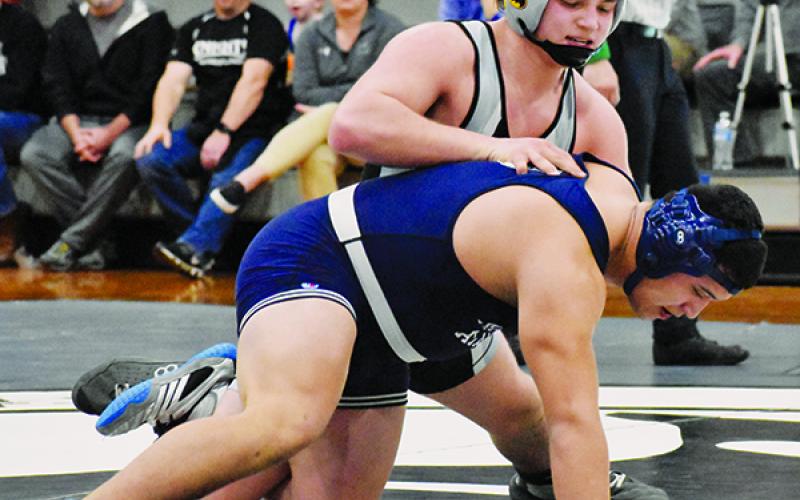 Robbinsville’s Kyle Fink controls Mount Airy’s Eric Olvera during the second round of the 1A state duals on Feb. 4. Photo by Kevin Hensley/editor@grahamstar.com