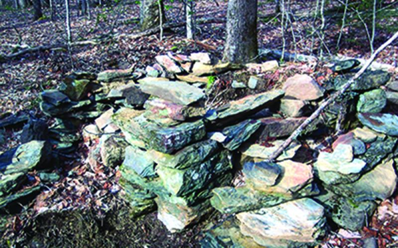 Part of the fireplace and chimney remain at the Whisenhunt homeplace on Frank’s Creek. Photo by Marshall McClung/The Graham Star