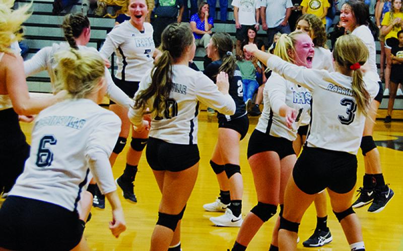 Jubilation sets in for the Robbinsvlle Lady Knights, moments after a thrilling 5-set victory over Murphy on Sept. 5. It was the first win for Robbinsville over the Lady Bulldogs since 2015. Photo by Kevin Hensley/editor@grahamstar.com