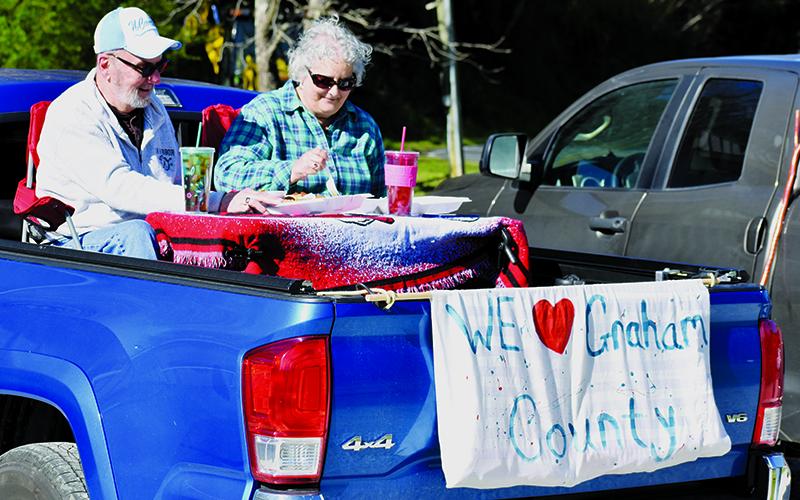 Rick and Joyce Mitchell found a creative way to enjoy their drive-in meal at  Stecoah Diner on April 2. Photos by Kevin Hensley/editor@grahamstar.com