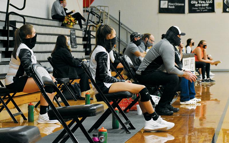 Both Robbinsville and Rosman adjusted to follow new protocols forced by COVID-19 at Monday's season opener, including two rows of socially-distanced chairs in place of a typical team bench.