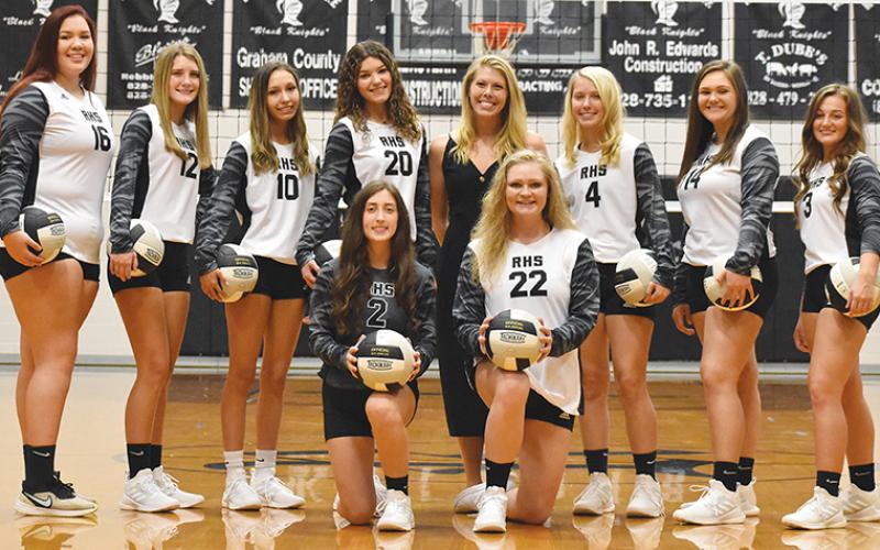 The 2020-21 Robbinsville Lady Knights are (front row): Gabby Hooper (left) and Karcee Dooley. Standing in back (from left) are Aubrie Wachacha, Kelsey Waldroup, Dallas Garrett, Yeika Jimenez, head coach Kadey Phillips, Kensley Phillips, Ivy Odom and Ally Ayers. Not pictured are Halee Anderson, Delaney Brooms and assistant coach Dede Brooms. Photo by Kevin Hensley/editor@grahamstar.com