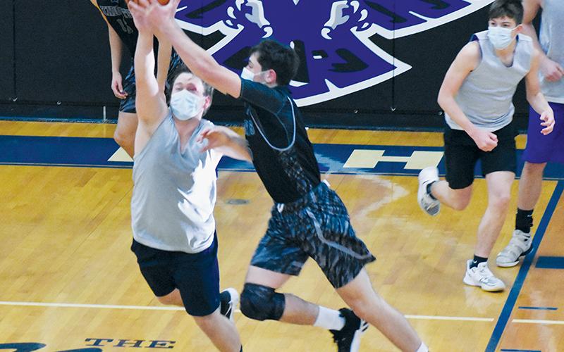 Robbinsville’s Nathan Collins plucks a steal away from Hiwassee Dam’s Michael Simms during a preseason scrimmage Saturday. Photos by Kevin Hensley/editor@grahamstar.com