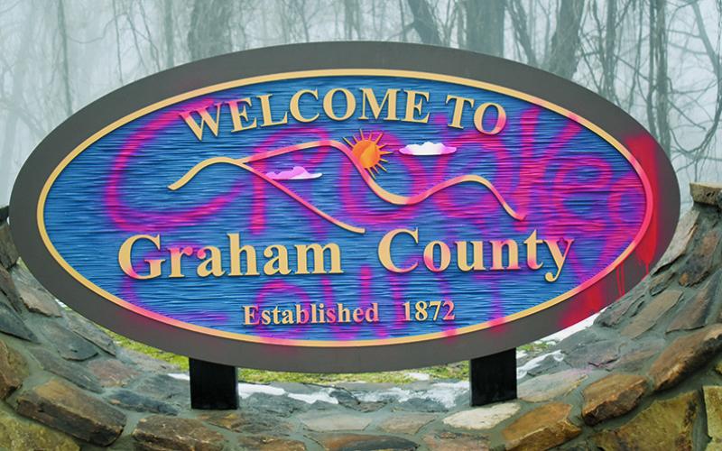 Graham County officials are still working to gather intel on who is responsible for vandalizing the new “Welcome to Graham County” sign near the U.S. 74 intersection in Topton over the holiday weekend. Photo by Charlie Benton/news@grahamstar.com