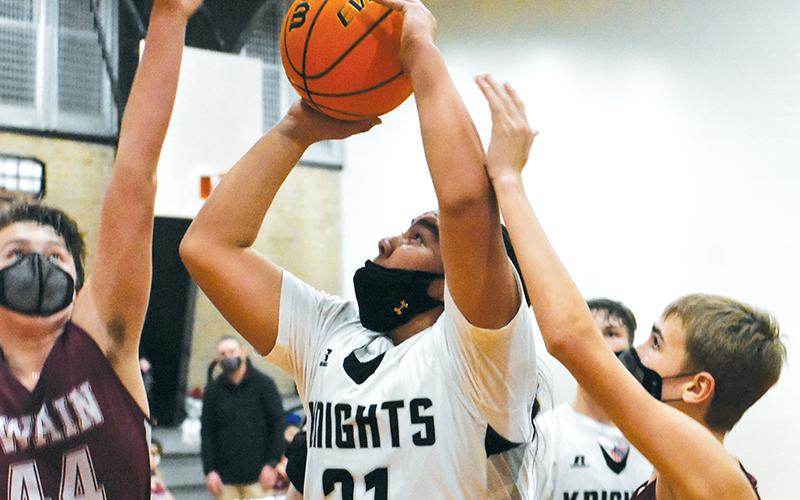 Amid heavy pressure from Swain County, Quinn Jumper eyes the bucket during a loss to the Maroon Devils on Feb. 11. Photos by Kevin Hensley/editor@grahamstar.com