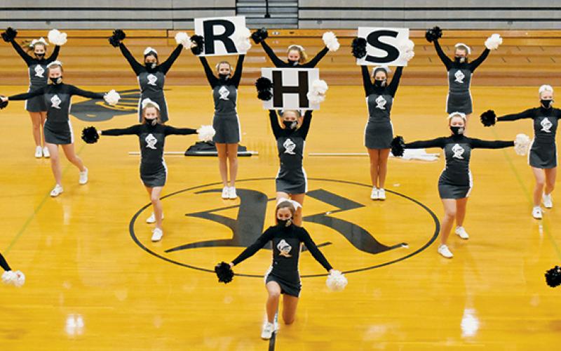The Lady Knights’ varsity cheerleaders perform their virtual, state routine Sunday at Robbinsville High School. Photos by Kevin Hensley/editor@grahamstar.com