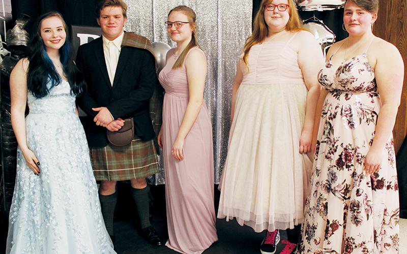 Isabella Hyde, Zeke Odom, Sabrina Orr, Cassie Sawyer and Christina Lancaster (from left) were able to re-create what should have been their 2020 prom group photo at Robbinsville High School’s Senior Sunrise Celebration on Wednesday, March 3. Photos by Charlie Benton/news@grahamstar.com