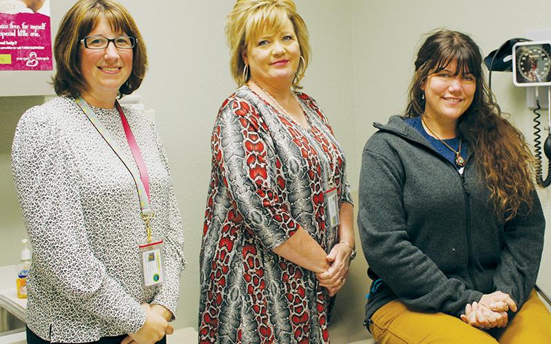 Health director Beth Booth, head nurse Lorita Eller and Community Care of North Carolina case investigator Michelle Stell are just some of the members of the Graham County Health Department that have been at the forefront of the local response to COVID-19. Photo by Charlie Benton/news@grahamstar.com