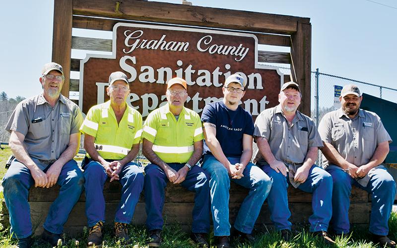 Members of the Graham County Sanitation Department make a living by cleaning up the county. From left are Harvey Bollinger, Richard Millsaps, Junior Shaffer, Chris Williams, Gavin Colvard and Scott Hooper. Not pictured are Samuel Shope, Bill Self and Myron Hidden. Photo by Art Miller/amiller@grahamstar.com