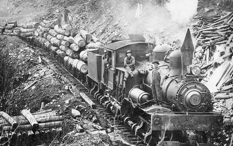 A logging train sits along the lower section of the Cheoah River in the 1920’s.