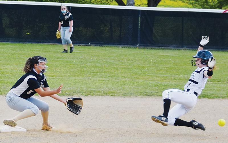 Aynsley Fink begins her slide into second base during the April 29 regular-season finale against Hayesville. Photo by Art Miller/amiller@grahamstar.com