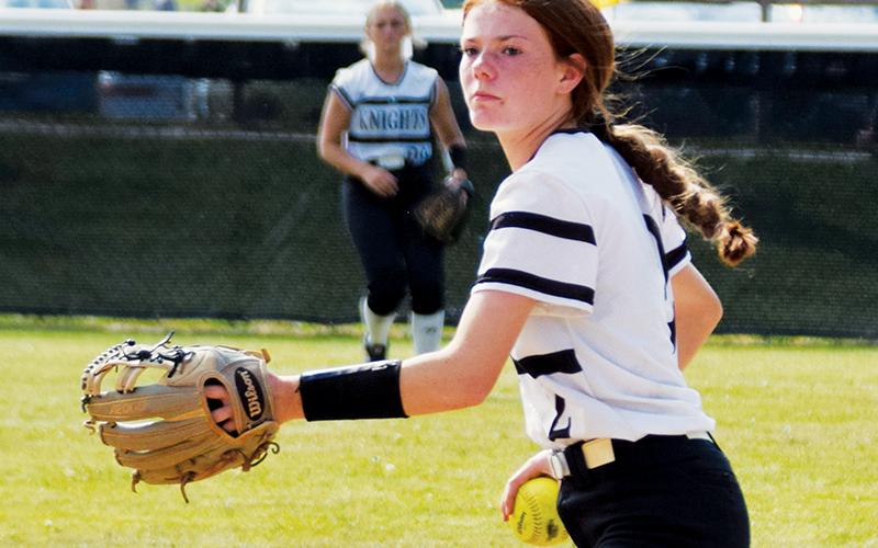 Robbinsville freshman Zoie Shuler eyes a throw to first base during April 28’s home game against Rosman. Shuler led the Lady Knights this season with 25 defensive assists. Photo by Art Miller/amiller@grahamstar.com