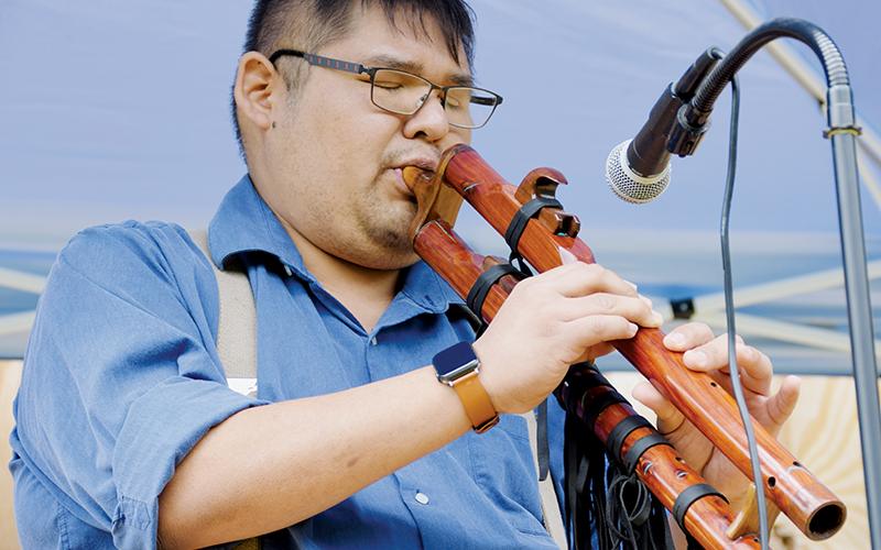 Matthew Tooni performs during a Cherokee flute demonstration at Saturday’s 35th Annual Fading Voices Demonstration Day in Snowbird. Photos by Art Miller/amiller@grahamstar.com