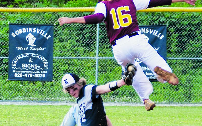 Cole Patterson makes sure that Cavan Reed’s clever attempt to avoid the tag is unsuccessful, during Tuesday’s home, regular-season finale against Cherokee. Photos by Art Miller/amiller@grahamstar.com
