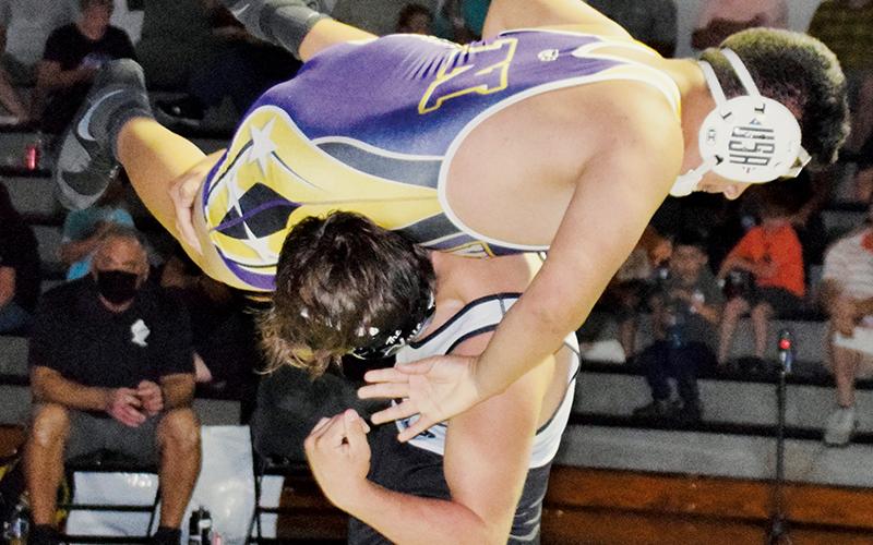 Kyle Fink has North Henderson’s Felix Montiel in a compromising position during the 195-pound bout of June 3’s “Battle of the Knights.” Fink would pin Montiel in the second period. Photos by Art Miller/amiller@grahamstar.com