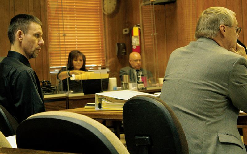 Casey Adam Haney (left) and his attorney Michael Fox in court Monday afternoon in Graham County. Haney is scheduled to be tried for two counts of indecent liberties with a child and one count of statutory rape this week. The incidents allegedly took place in 2017 and 2018 with the same female victim. Photo by Charlie Benton/news@grahamstar.com